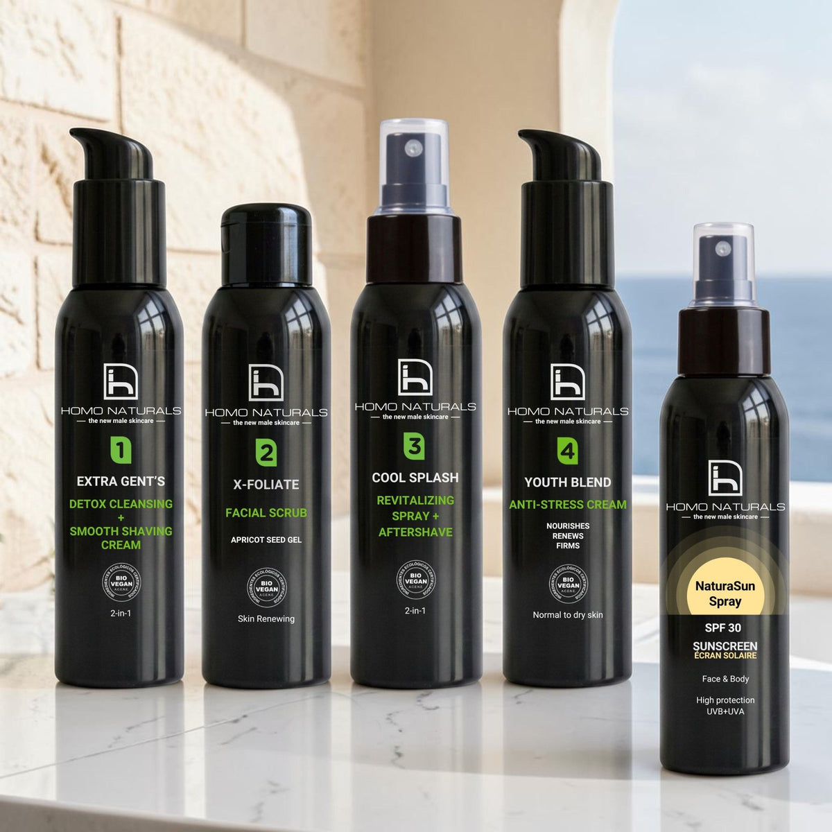 Imagen del tratamiento facial para hombre de Homo Naturals con protector solar. Incluye limpiador facial, exfoliante, tónico revitalizante y gel o crema antiedad según el tipo de piel. Incluye además un protector solar en spray. El objetivo es conseguir un rostro más cuidado, con piel más uniforme y rejuvenecida.